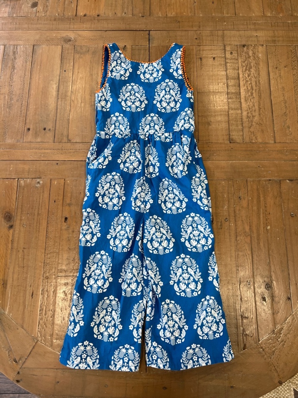 Mini Boden blue pineapple bird romper 5-6 years cross back Pom Poms